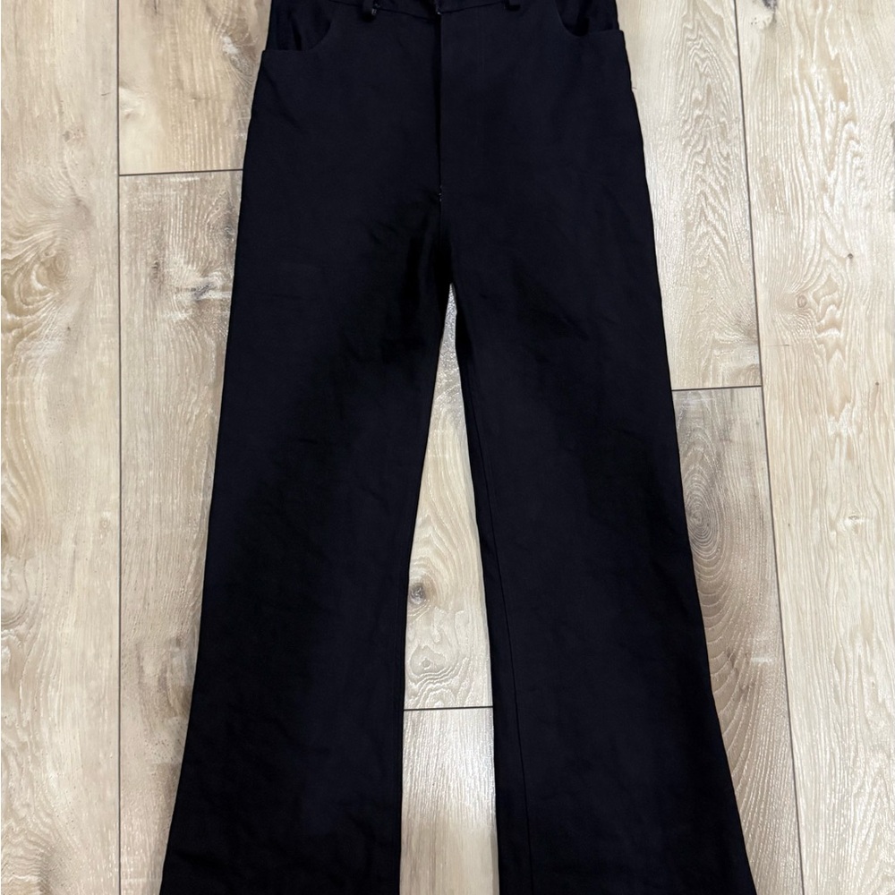 TemporaryFromBrazil triple black flare jeans